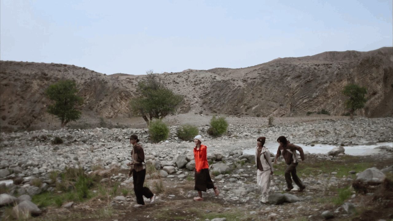 The concept film follows movement between outdoor exploration and daily life.